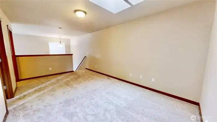 Upstairs family room opens to lower level