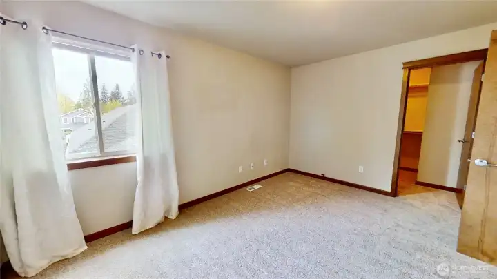 Upstairs bedroom 2 with walk-in closet.