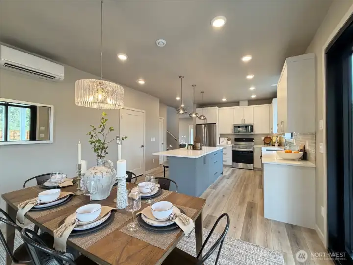 So much natural light with lots of windows and French door slider access to covered patio.