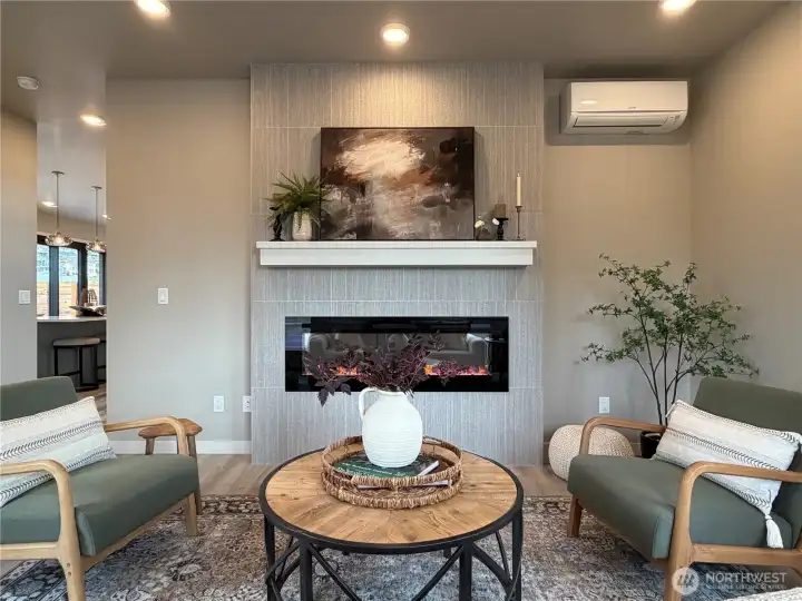 Custom designed tiled LED fireplace that provides heat and multiple light options.