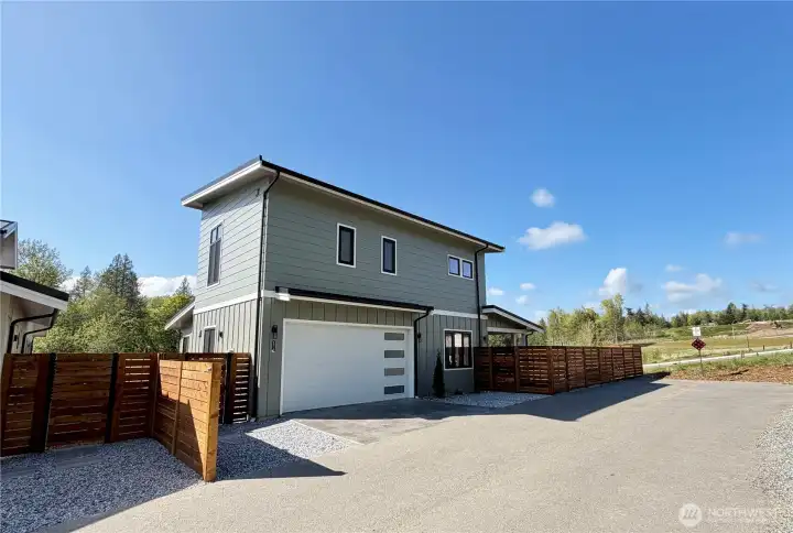 Garage accessed of dead end alley so less traffic.