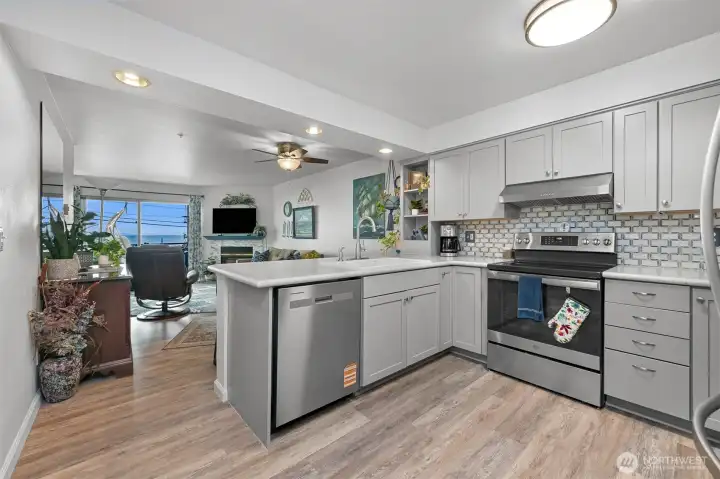 Updated open kitchen with views of the bay.
