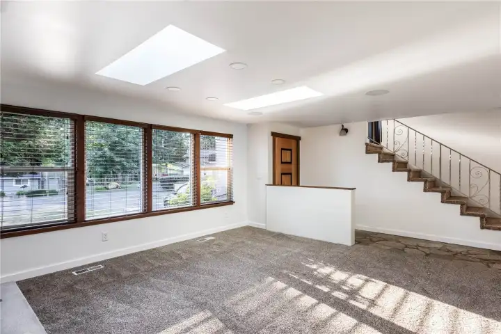 The staircase that leads to the primary bedroom and a second bedroom. The staircase that leads to the primary bedroom and a second bedroom.