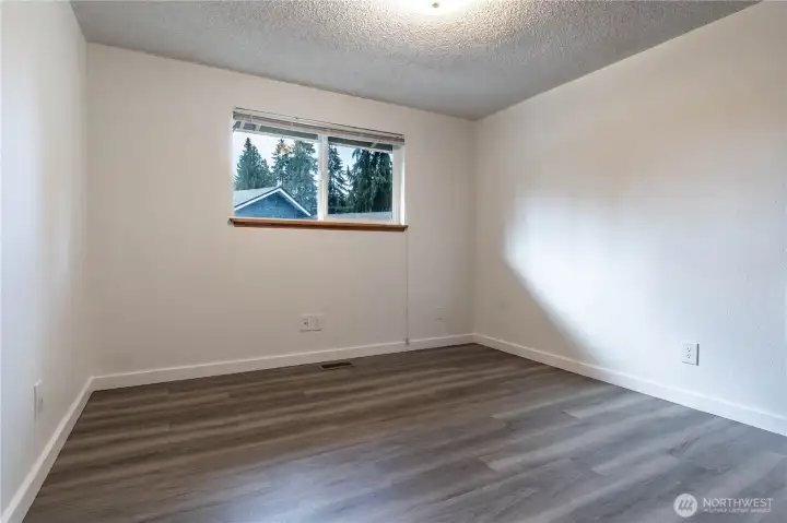 The 2nd bedroom that is also upstairs, could be an office or a guest bedroom The 2nd bedroom that is also upstairs, could be an office or a guest bedroom
