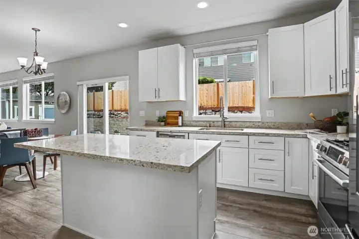 Kitchen flows into another dining area and opens to the wonderful family room. Kitchen flows into another dining area and opens to the wonderful family room.