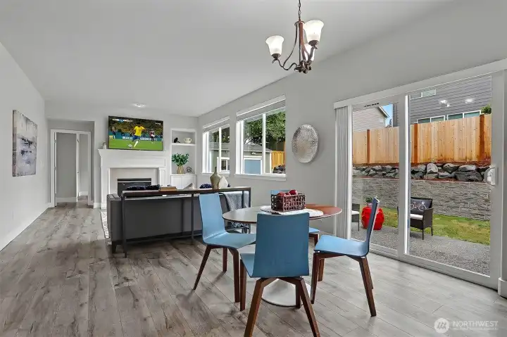 This dining area has direct access to the backyard through the large glass sliders. This dining area has direct access to the backyard through the large glass sliders.