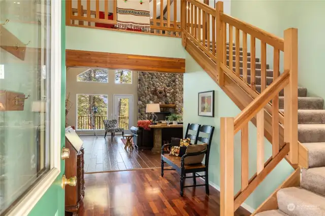 Stairs lead to an office and large bonus room with 1/2 bath.
