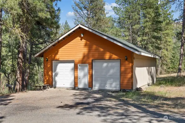 28x36 detached garage has room for 2 cars and large workshop.