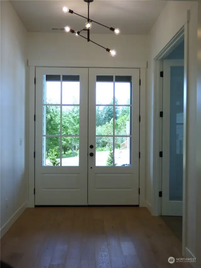 Spacious entry with high ceilings.