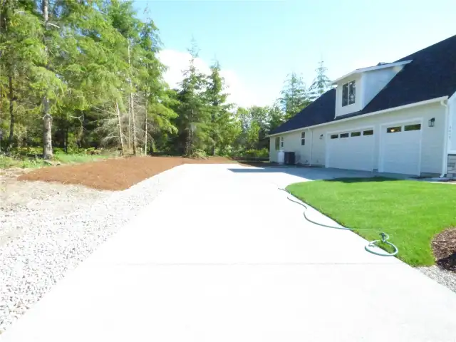 Large driveway to 3 car-garage and still plenty of room for your RV or boat.