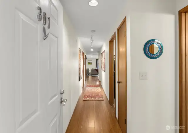 Front hallway leads straight to main living area and view, with 2 large closets for move storage