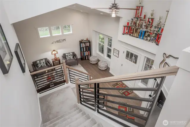 Open entry plan with high ceilings and skylights.