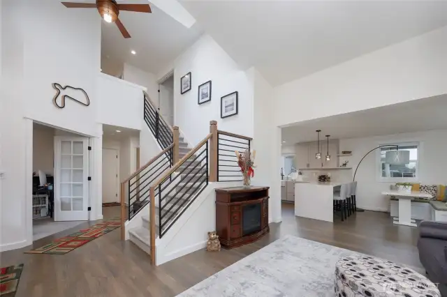 Open entry plan with high ceilings and skylights.