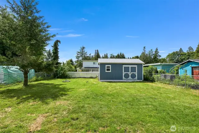 Outbuilding and large backyard
