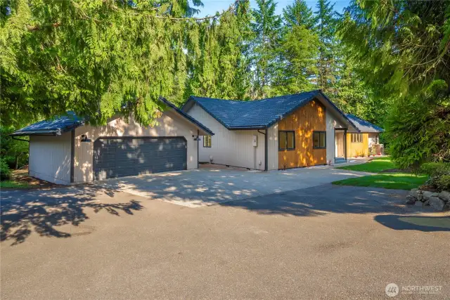 PLENTY OF PARKING AND DETACHED GARAGE.