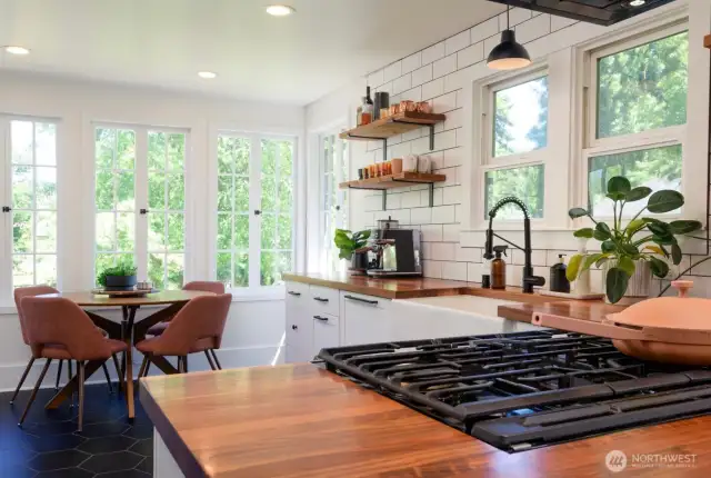 Sleek finishes, smart storage, and stainless appliances make this kitchen both beautiful and functional.