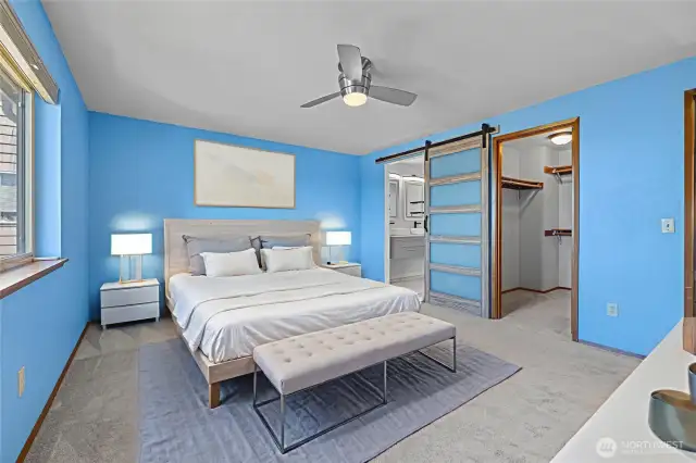 Additional view of primary bedroom virtually staged