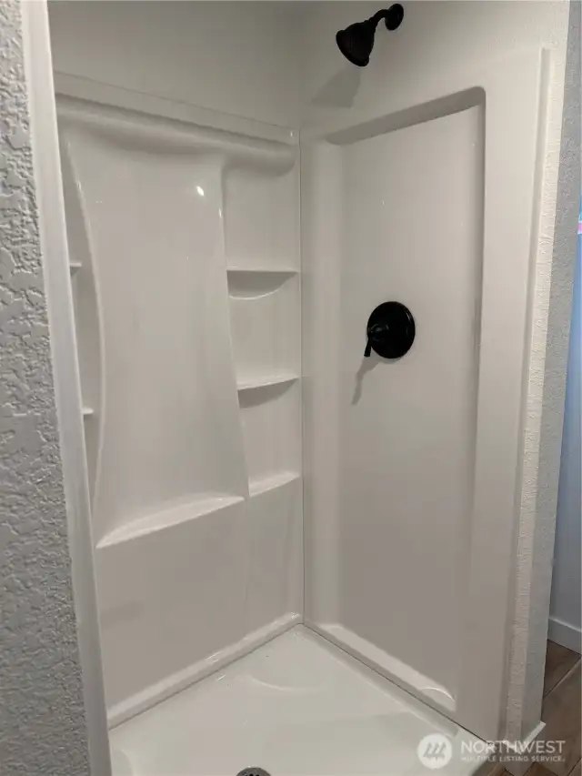 Shower in the 2 bedroom unit