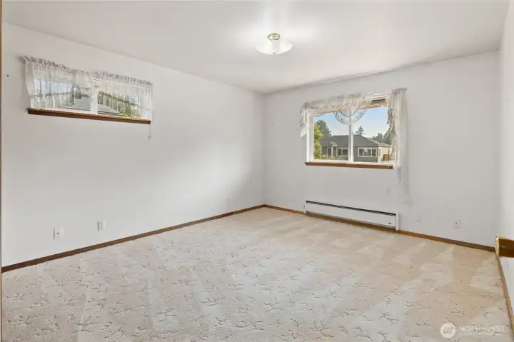 Primary bedroom located off the living room.