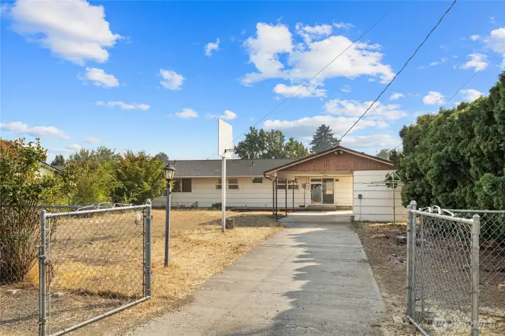 There is alley access to the backyard with extra parking space.