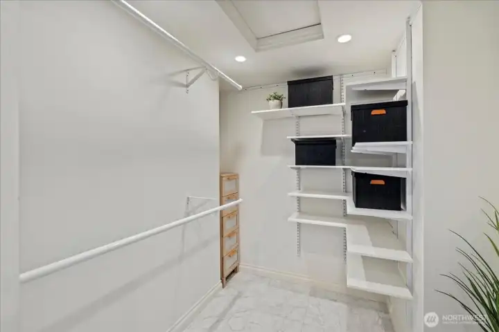 The walk-in closet maximizes storage space and has room for a dresser and a lot of hanging space.