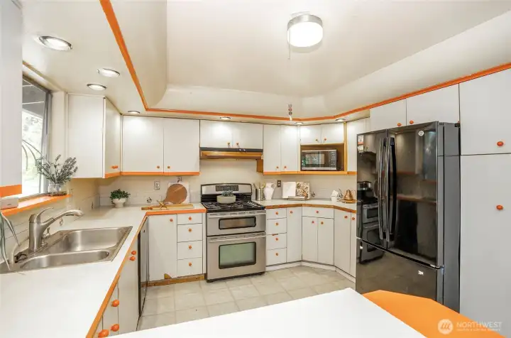 Large open kitchen with seating