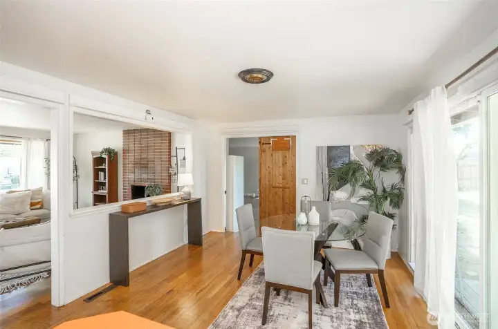 Dinging room with entrance to the large den, flex space or 4th bedroom.