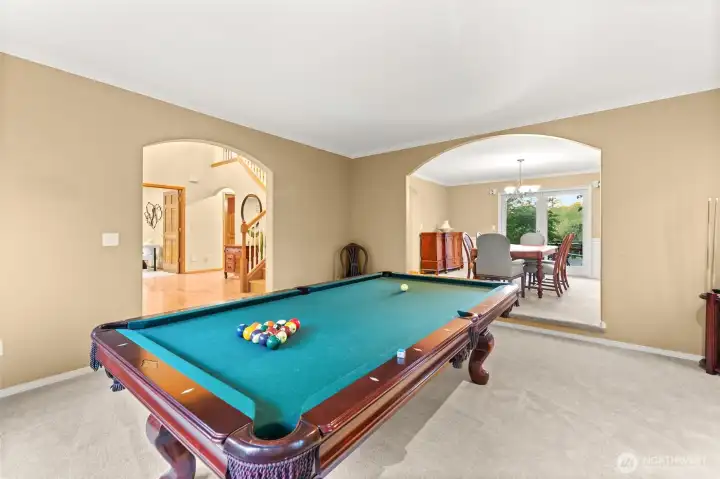 Formal living room offers flexibility for entertaining or quiet moments.