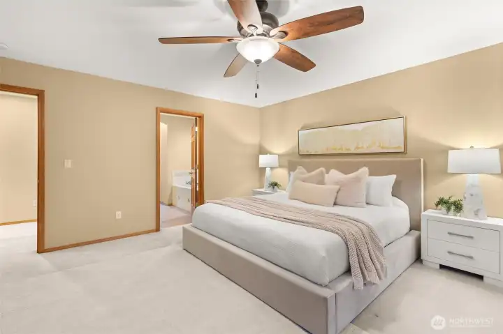 Elegant primary suite with tranquil views and easy access to the luxury bath.