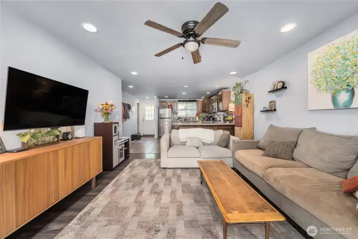 Unit 2 – Living Room: Indoor-outdoor convenience  Ceiling fan, energy-efficient windows, and step-out to the outdoor patio—ideal for entertaining, gardening, or pets.