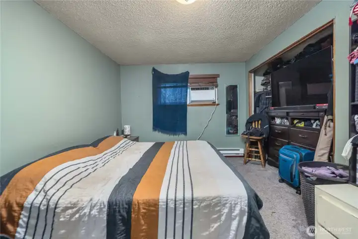 Unit 1 Comfortable layout with room for a full bedroom set, plus dual window exposure for ventilation and added natural light.