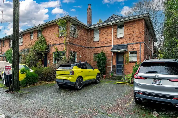 Off street parking - 511 1/2 has the middle space on the south side of the parking area.