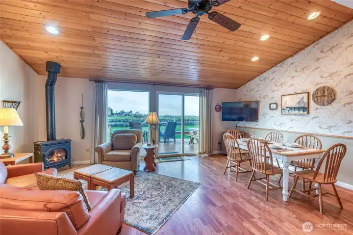 Enter into the great room with a west-facing view for stunning sunsets and active marine and aeronautical views.