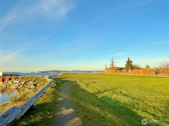 A trail along the shore leads up to the private waterfront with one of the few actual beaches on Orcas Island.