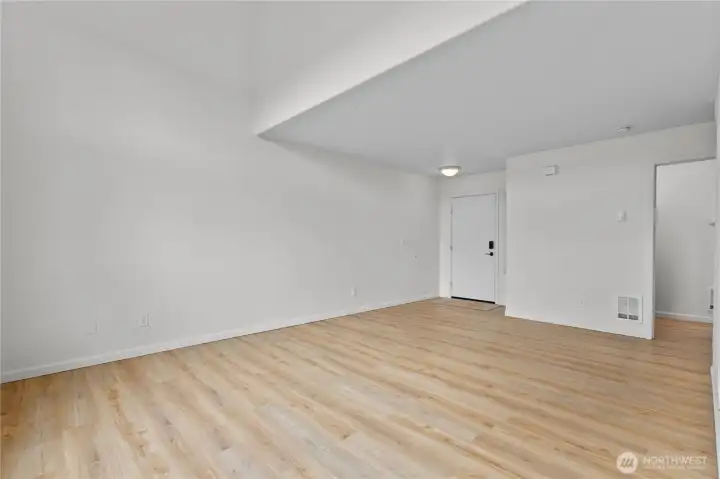 There is also a powder room (right door) and laundry area