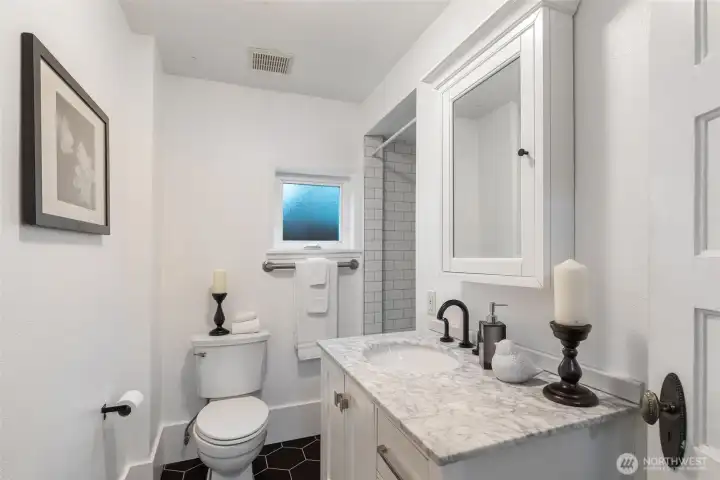Fully remodeled 3/4 bathroom in 2025.