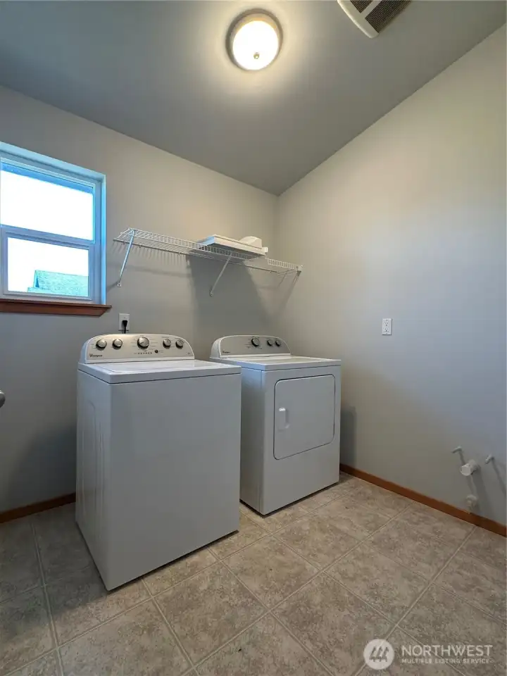 Generous utility room with set-up for sink or tub