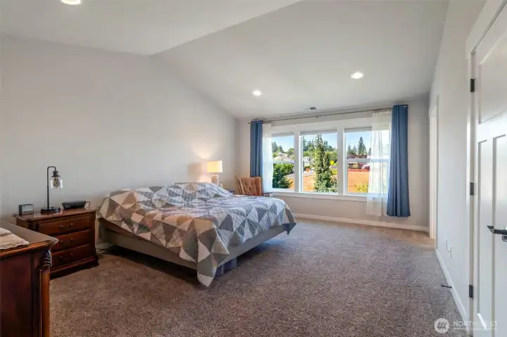 Spacious Primary Suite With Vaulted Ceilings