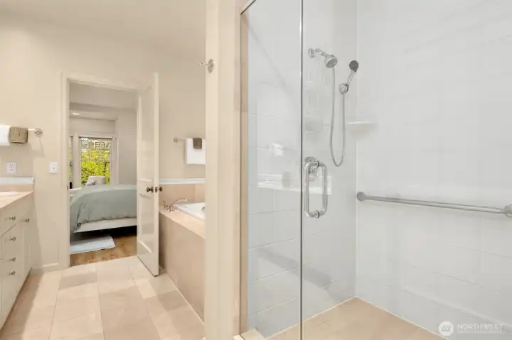 Separate walk-in shower and soaking tub