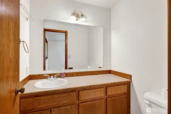 The bathroom off the primary is a ½ bath