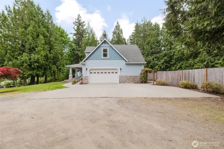 Plenty of parking available and 2 car garage also boasts 2 large storage rooms.