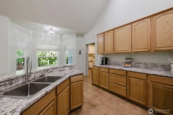 Kitchen includes brand new granite countertops.