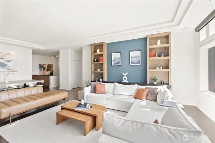 Warm oak floors and a timeless design anchor this open living area