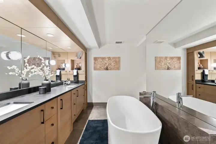 Expansive mirrors enhance the luxurious feel