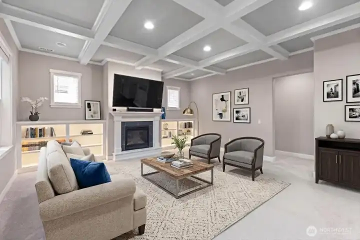 Digitally staged rendering shown for illustrative purposes. This flexible space offers a variety of potential uses, and the rendering demonstrates one option for furniture placement and room layout to help visualize the possibilities.
