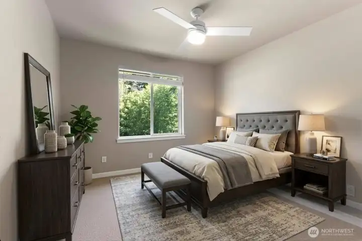 Bedroom 2 of 4 on second floor, ceiling fan. *Some decor digitally staged.