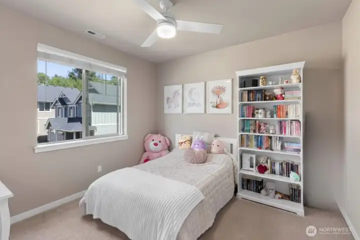 Bedroom 3 of 4 - has a great walk in closet & ceiling fan! *Some decor digitally staged.