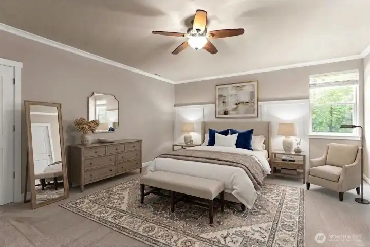 Primary bedroom is massive and features French doors, ceiling fan and gas FP. *Some decor digitally staged.