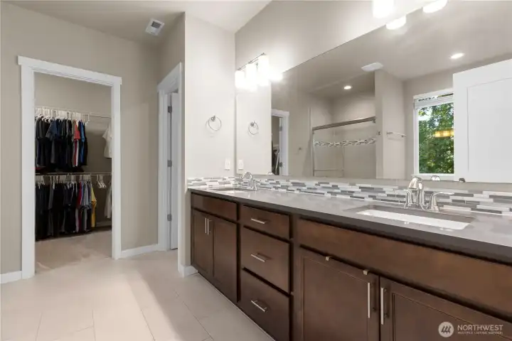 Primary bathroom and walk in closet, separated "water closet".