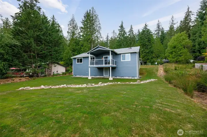 Expansive backyard waiting for your imagination - gazebo, firepit, garden space or more